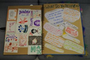 Kadimah Plagim Project 5772 – 2012 scrapbook, ring-bound, with feathers, tied with ribbon • Liberal Judaism Archive
