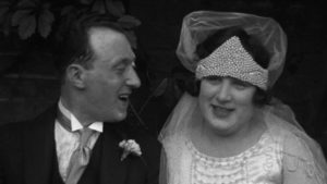 Black and white still from 'The Marriage of Miss Rose Carmel and Mr Solly Gerschcowit', 1925 • BFI National Archive